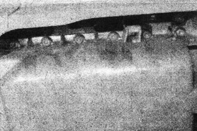 14.12. Болты крепления передней части поддона (вид из-под автомобиля) - двигатель F7P (с 16…