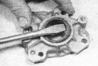 10.9a. Remove the intermediate shaft seal from the housing.