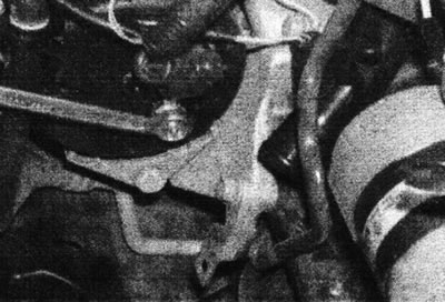 5.11 Remove the wiring harness retaining nut from the rear of the generator - D-series engine.