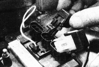 4.2. Disconnect the multi-pin connectors from the ignition module. The third slot is not used on…
