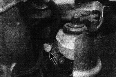 4.1. Vacuum booster check valve (marked with an arrow).