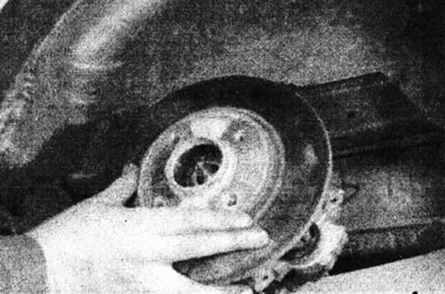 18.9b.... and install the disc on the steering knuckle.
