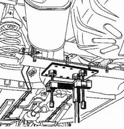 9. Подведите под балки оси гидравлический домкрат.