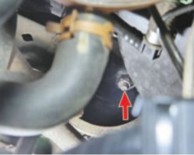 bend back the boot covering the lower universal joint of the steering shaft under the vehicle and…