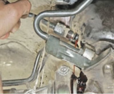 disconnect the low and high pressure lines from the steering gear housing (taking measures to…